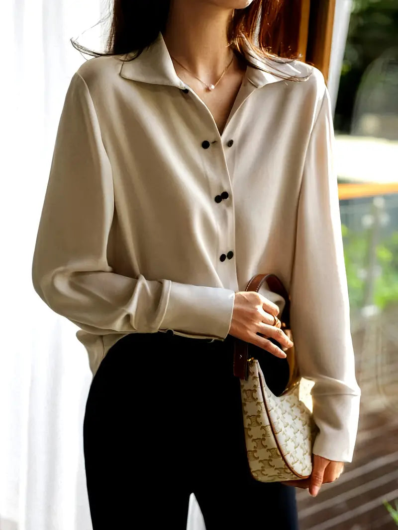 Blouse with Asymmetrical Button Design and Soft Flowy Drape in Lightweight White Fabric