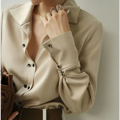 Blouse with Asymmetrical Button Design and Soft Flowy Drape in Lightweight White Fabric