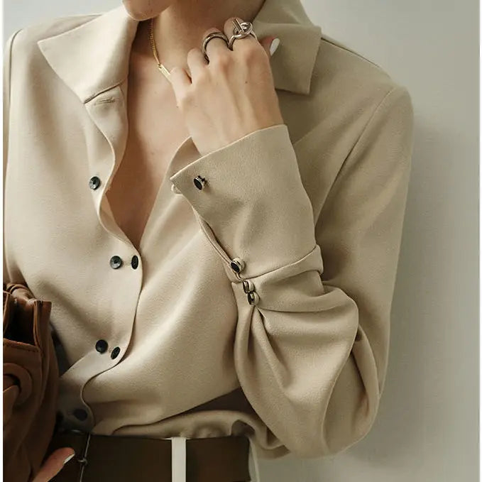 Blouse with Asymmetrical Button Design and Soft Flowy Drape in Lightweight White Fabric