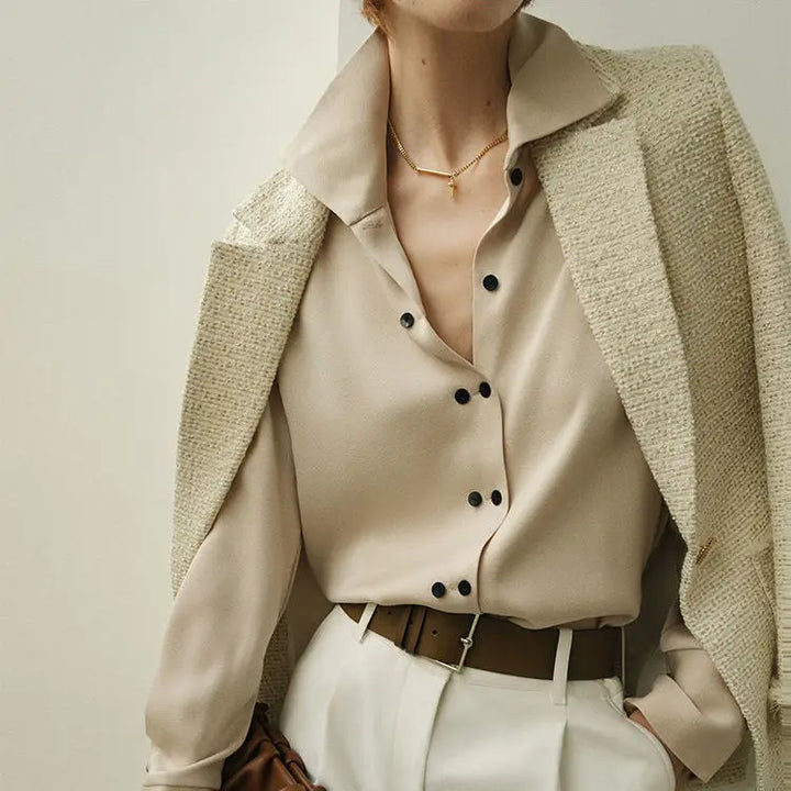 Blouse with Asymmetrical Button Design and Soft Flowy Drape in Lightweight White Fabric