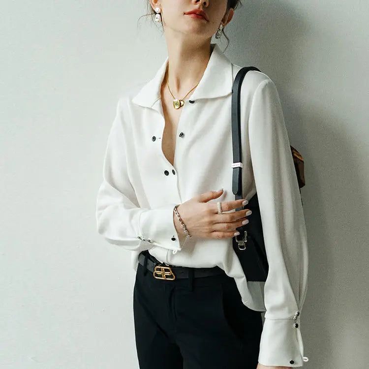 Blouse with Asymmetrical Button Design and Soft Flowy Drape in Lightweight White Fabric