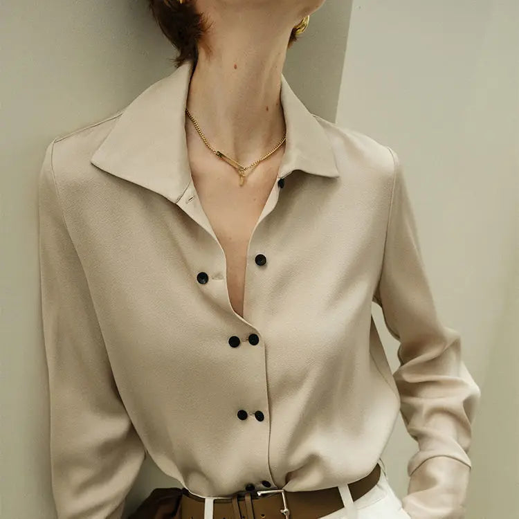 Blouse with Asymmetrical Button Design and Soft Flowy Drape in Lightweight White Fabric