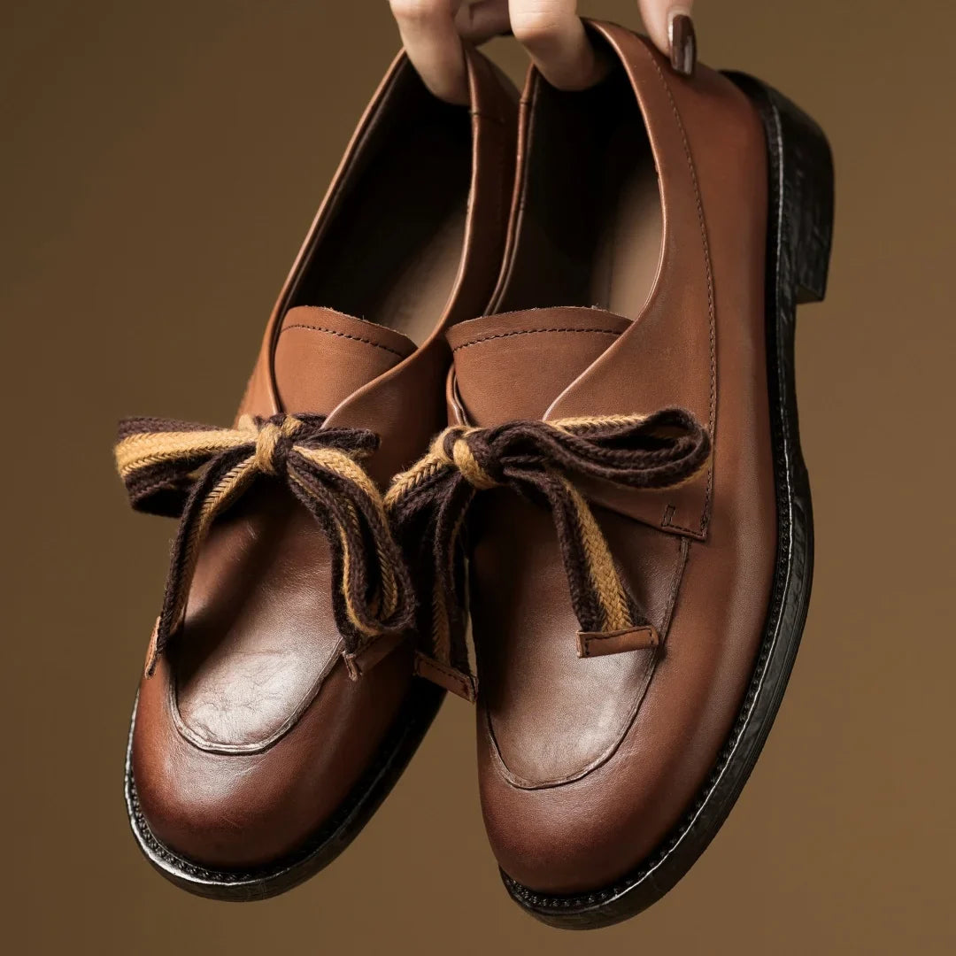 Two-Tone Leather Loafers with Woven Lace Detail and Cushioned Comfort Sole