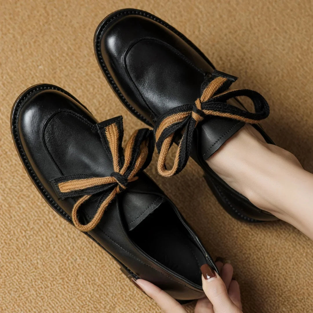 Two-Tone Leather Loafers with Woven Lace Detail and Cushioned Comfort Sole