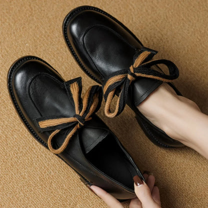 Two-Tone Leather Loafers with Woven Lace Detail and Cushioned Comfort Sole