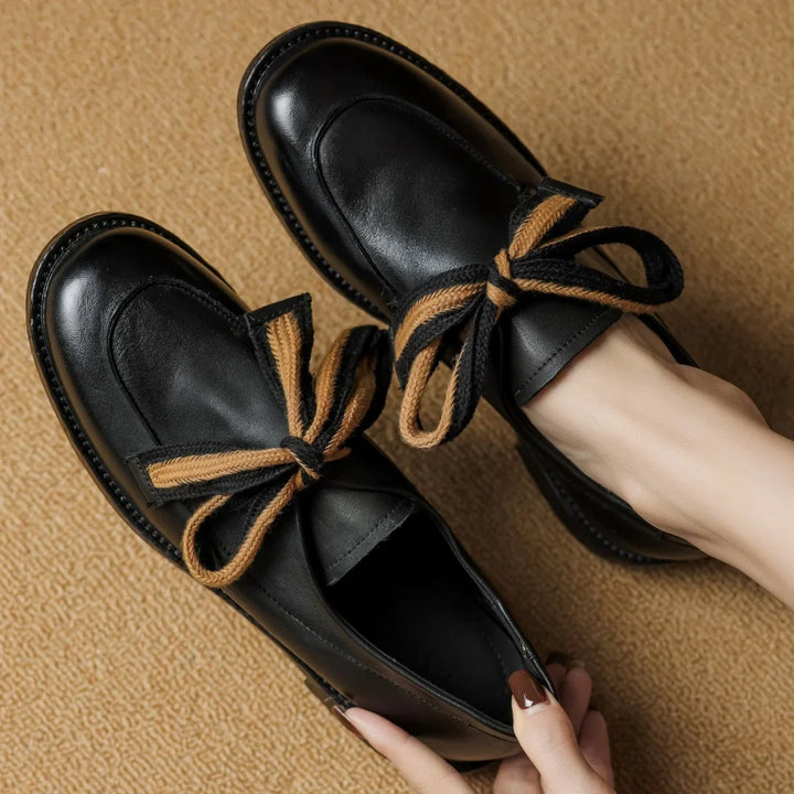 Two-Tone Leather Loafers with Woven Lace Detail and Cushioned Comfort Sole