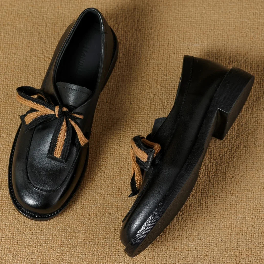 Two-Tone Leather Loafers with Woven Lace Detail and Cushioned Comfort Sole