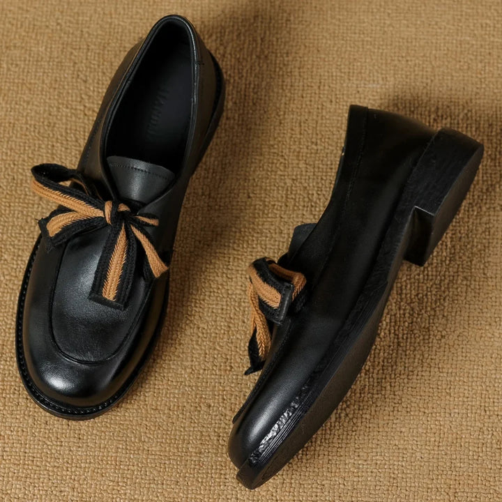 Two-Tone Leather Loafers with Woven Lace Detail and Cushioned Comfort Sole