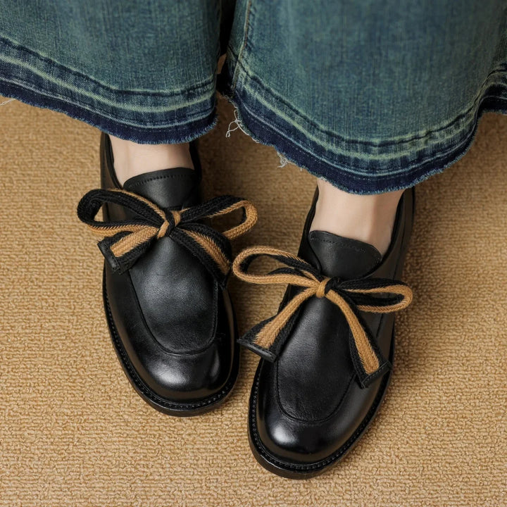 Two-Tone Leather Loafers with Woven Lace Detail and Cushioned Comfort Sole