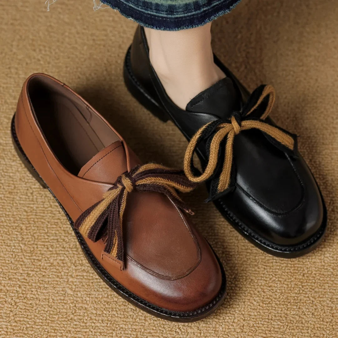 Two-Tone Leather Loafers with Woven Lace Detail and Cushioned Comfort Sole
