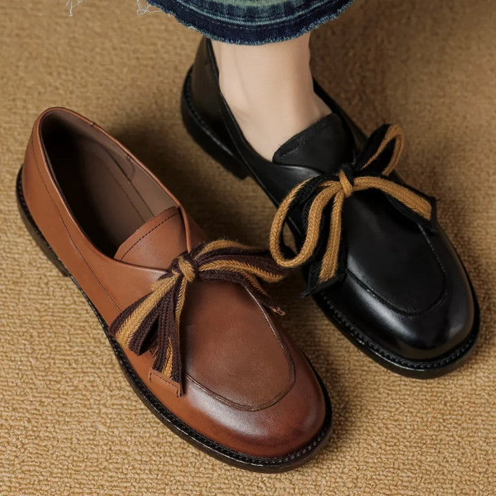 Two-Tone Leather Loafers with Woven Lace Detail and Cushioned Comfort Sole