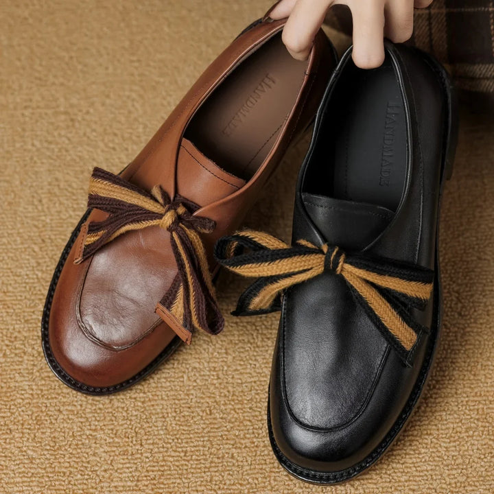 Two-Tone Leather Loafers with Woven Lace Detail and Cushioned Comfort Sole