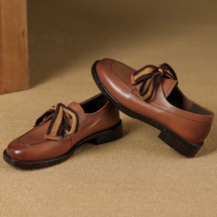 Two-Tone Leather Loafers with Woven Lace Detail and Cushioned Comfort Sole