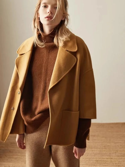 Oversized Cashmere Turtleneck Sweater with Relaxed Fit and Soft Ribbed Knit in Rich Brown