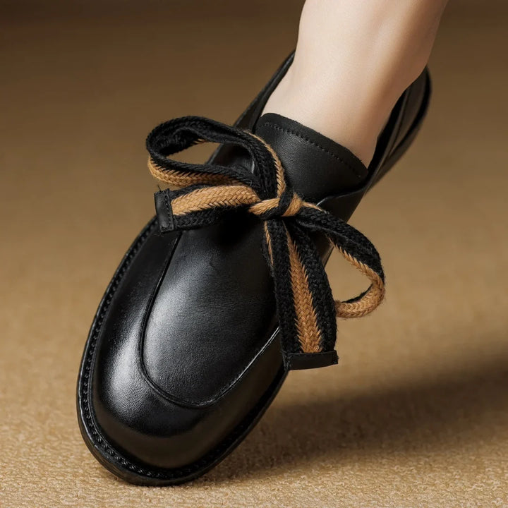 Two-Tone Leather Loafers with Woven Lace Detail and Cushioned Comfort Sole