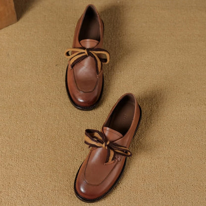 Two-Tone Leather Loafers with Woven Lace Detail and Cushioned Comfort Sole