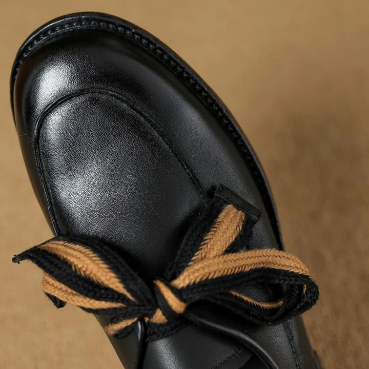Two-Tone Leather Loafers with Woven Lace Detail and Cushioned Comfort Sole
