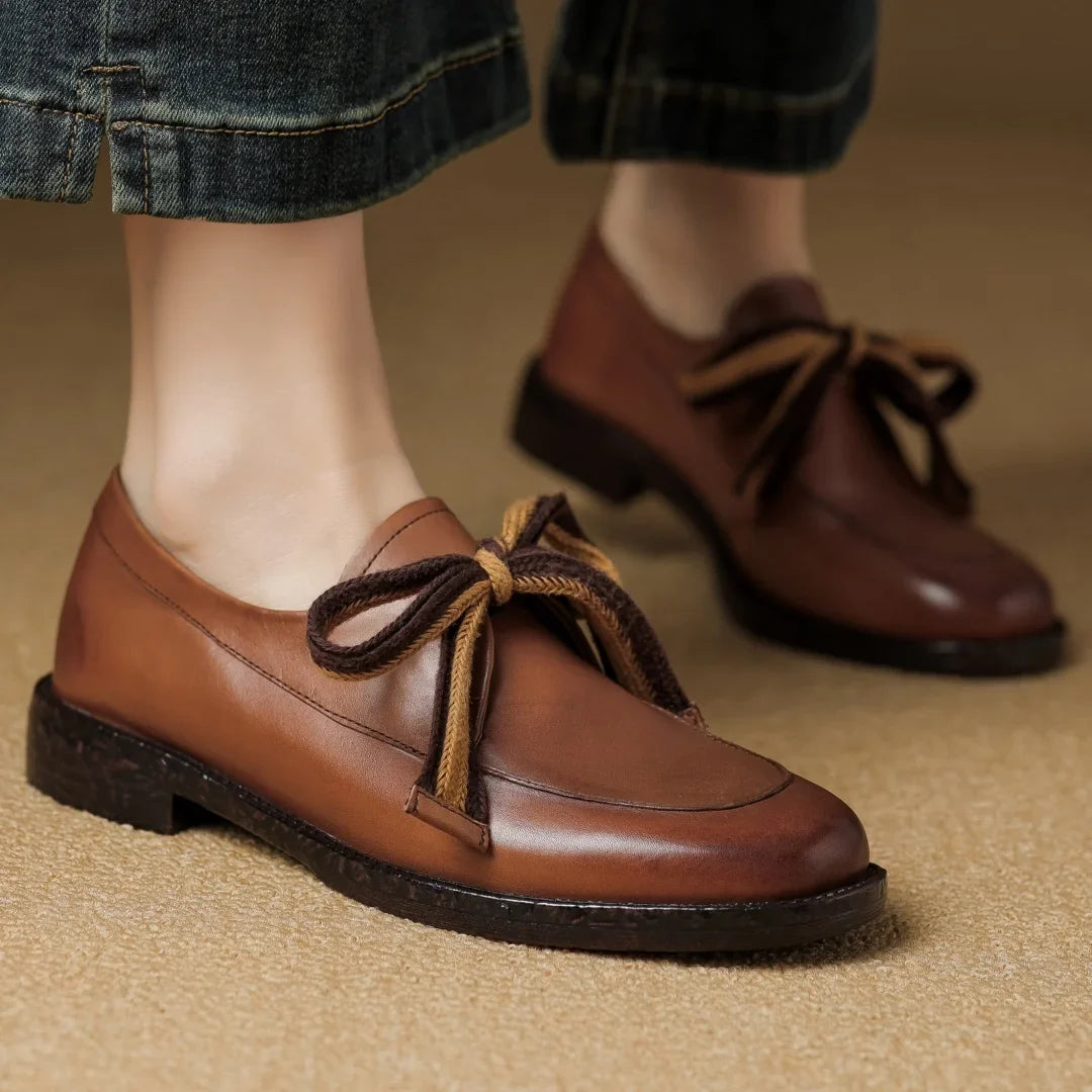 Two-Tone Leather Loafers with Woven Lace Detail and Cushioned Comfort Sole