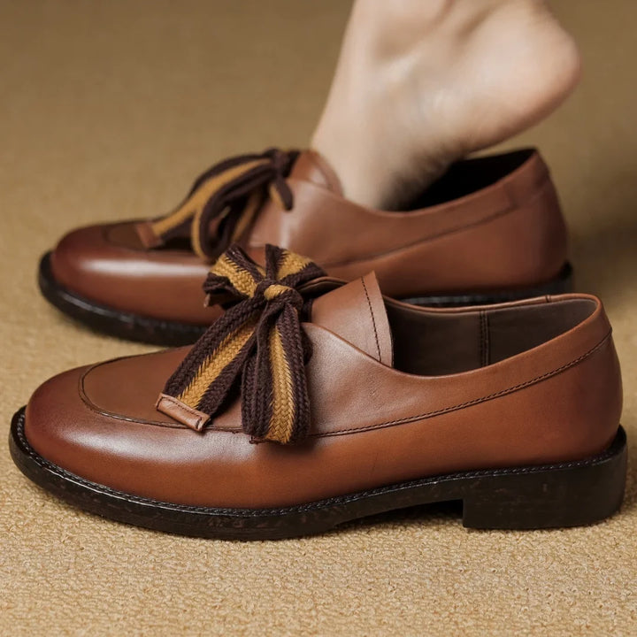 Two-Tone Leather Loafers with Woven Lace Detail and Cushioned Comfort Sole